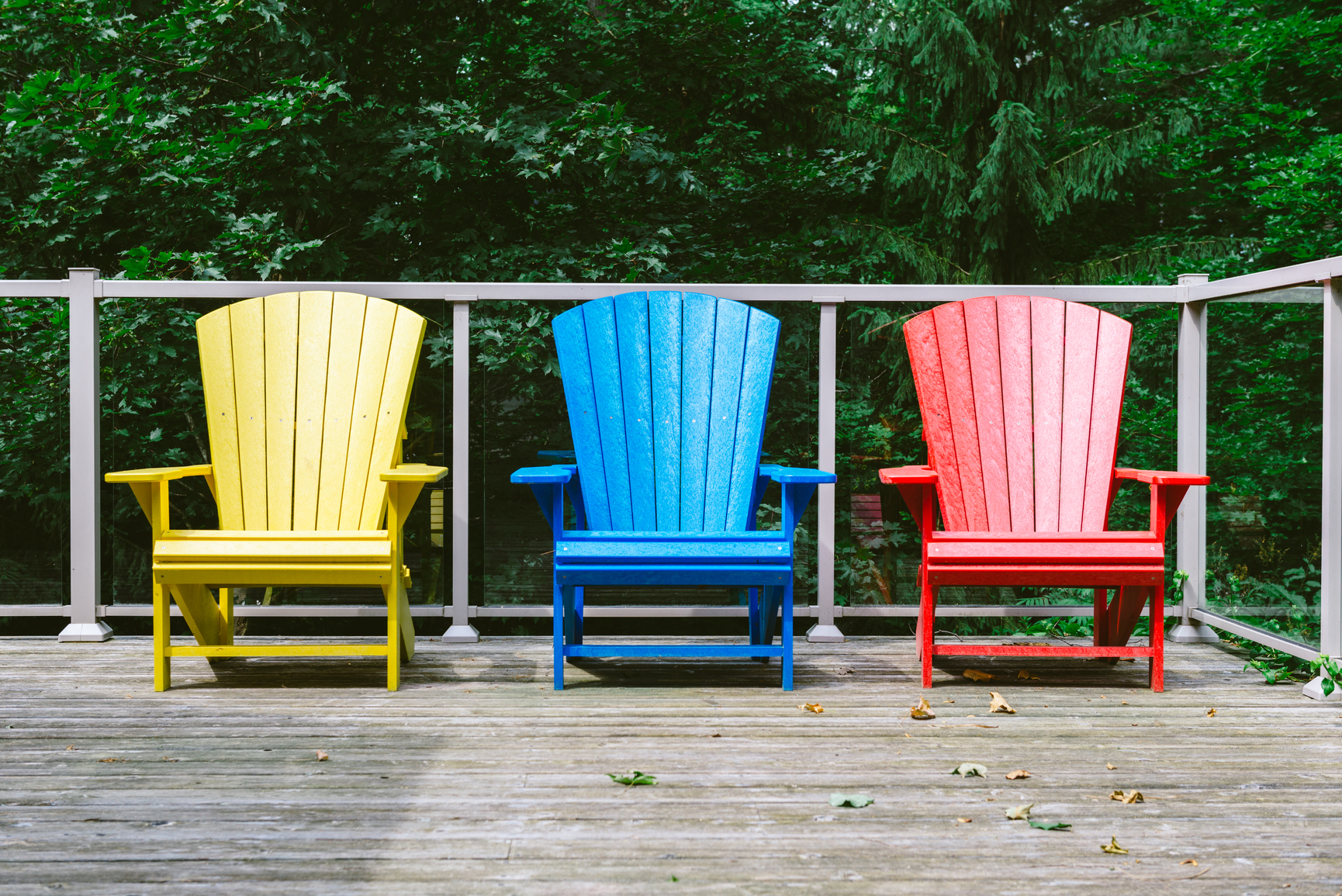 Adirondack chairs outside on the deck.