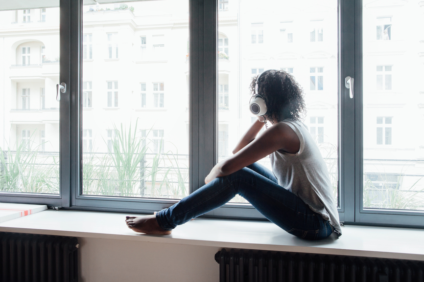 African Woman Listening Music