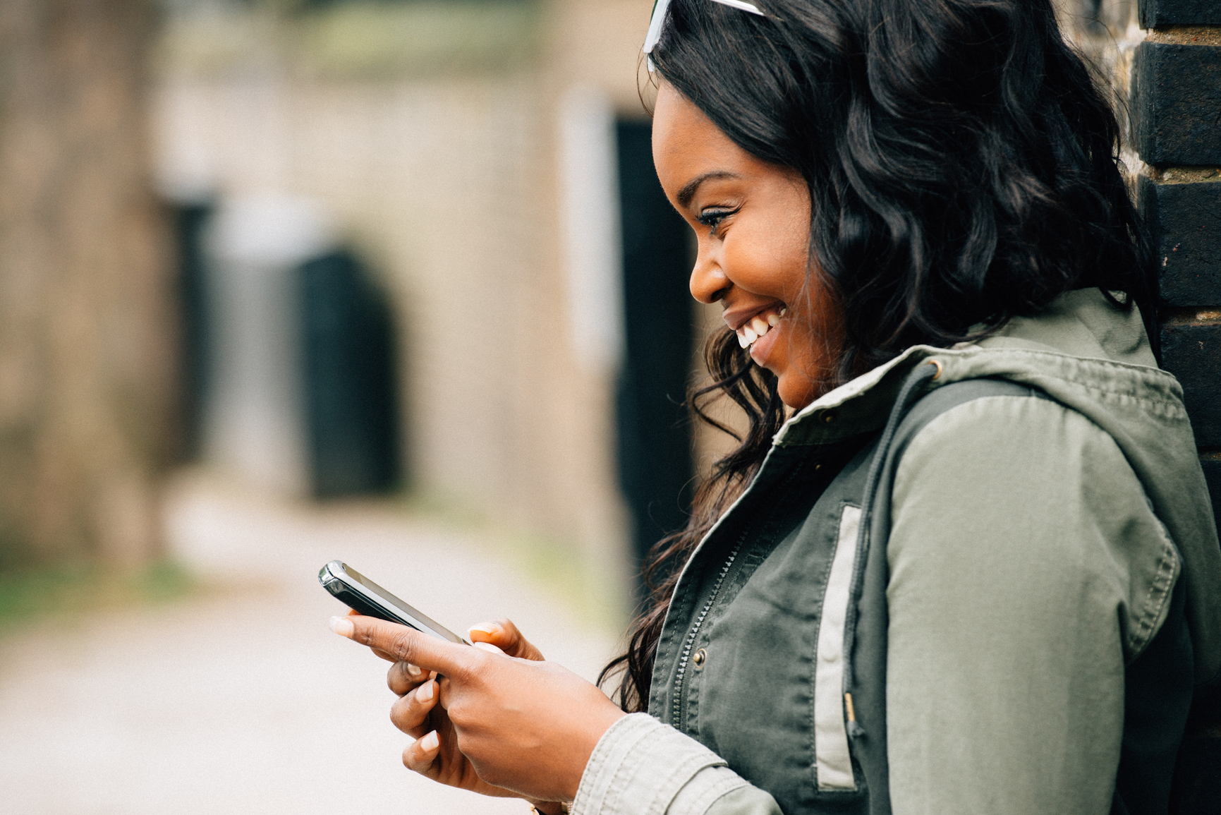 African-American Girl using Mobile Phone